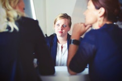 businesswoman with customers